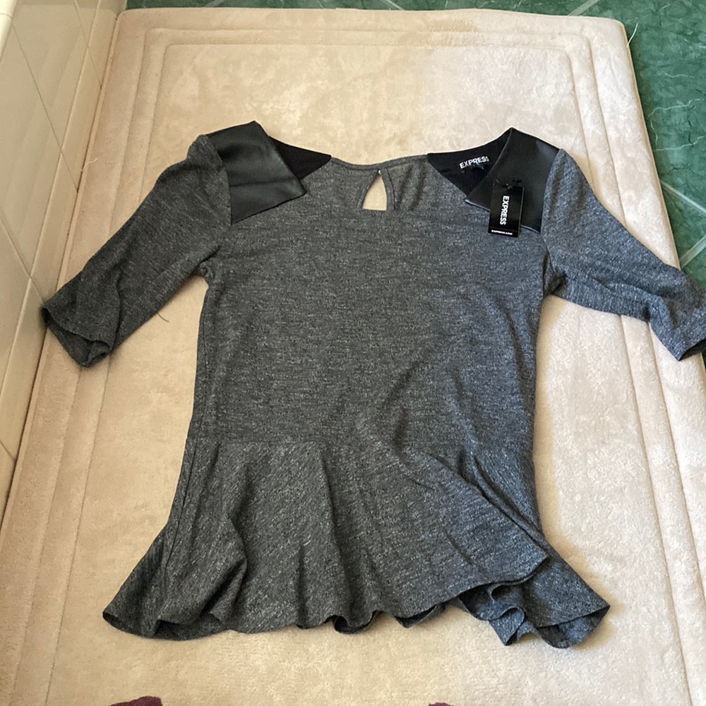 Gray pullover shirt with faux leather. Never worn brand new.